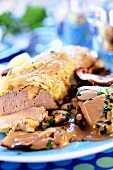 Pork loin in pastry with mushroom sauce