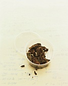 Dried morels in a plastic container