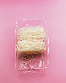 Glass noodles in a plastic container