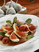 Figs with raspberries and melon sauce