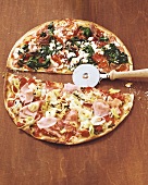 Leek and ham pizza, spinach and pepper pizza