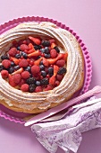 Pastry ring filled with berries and coconut yoghurt