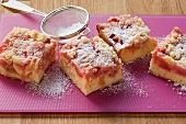 Rhubarb cake with almond crumble