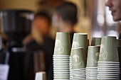 Stacked paper cups in a cafe