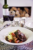 Braised oxtail with mashed potato and root vegetables