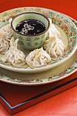 Dumplings with pork filling, soy sauce (China)
