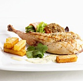 Grilled rabbit leg with accompaniments