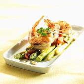 Fried prawns on asparagus