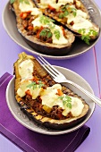 Aubergines with mince stuffing and yoghurt sauce