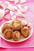 Chocolate macarons and pink roses
