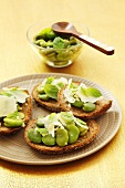 Bruschettas with beans, garlic, Parmesan and mint