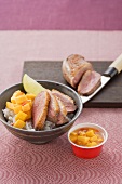 Honey-glazed duck breast with chilli mango compote