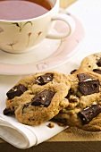 Cookies with pieces of chocolate, tea