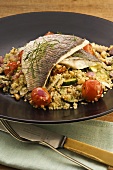 Warm quinoa salad with snapper and cherry tomatoes