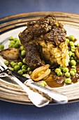 Beef cheeks with beer gravy and peas