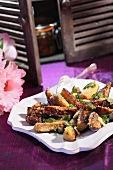 Deep-fried aubergine sticks with herbs