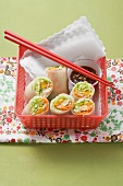 Spring rolls with mango and smoked trout filling