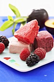 Building bricks of blackberry, raspberry and plum ice cream