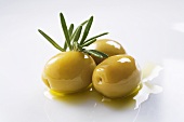 Green olives with olive oil and rosemary
