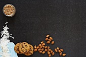 Still life with almonds, chocolate chip cookies, short-grain rice and cereal