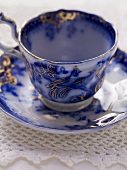 A soup cup and saucer
