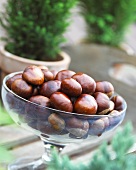 Sweet chestnuts in a glass bowl