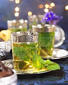 Mint tea with fresh mint leaves in glasses