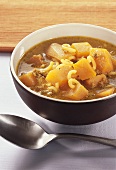 Pumpkin soup with mince and noodles