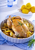 Stuffed chicken with rosemary, potatoes and lemons