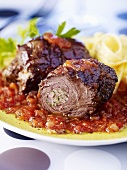 Beef roulades on tomato sauce