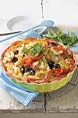 Pasta bake with herbs and olives