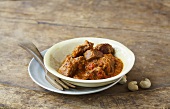 Lamb curry with tomatoes and cardamom