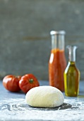 Pizza dough, tomatoes, ketchup and olive oil