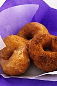Doughnuts with icing and with cinnamon sugar