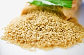 Brown rice spilling out of packaging