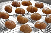 Candied chestnuts on cake rack