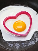 Fried egg with heart-shaped cutter
