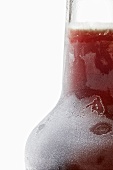 Amaro herbal liqueur in icy bottle (detail)
