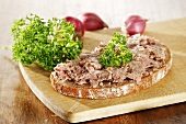 Coarse liver sausage on bread