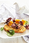Focaccia with octopus and polenta skewers
