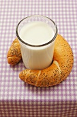 Poppy seed croissant and glass of milk