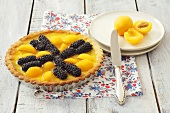 Blackberry and apricot tart with jelly