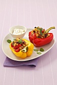 Peppers stuffed with couscous, tomatoes and raisins