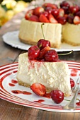 Baked cheesecake with strawberries and cherries