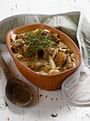 Braised chicken with parsnips and herbs