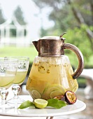 Sparkling wine punch with lime and passion fruit