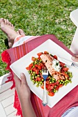 Poached salmon with peas and tomatoes