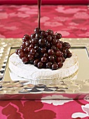 Brie with glazed grapes