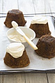 Carrot cakes with cream cheese icing