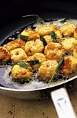 Ricotta gnocchi with sage in frying pan